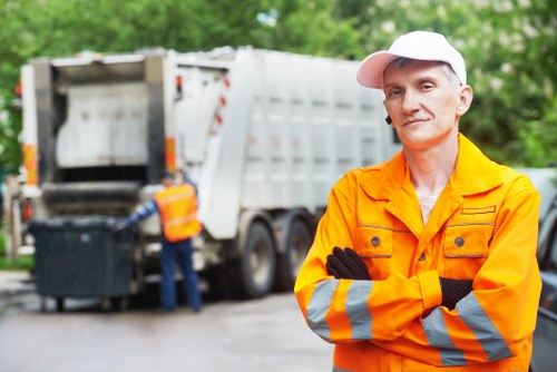 Team of professionals conducting garage clearance in Maidavale